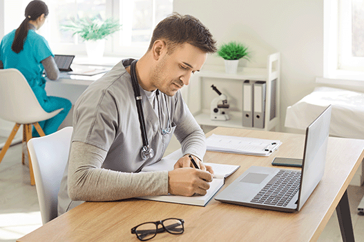 nurse working on paperwork